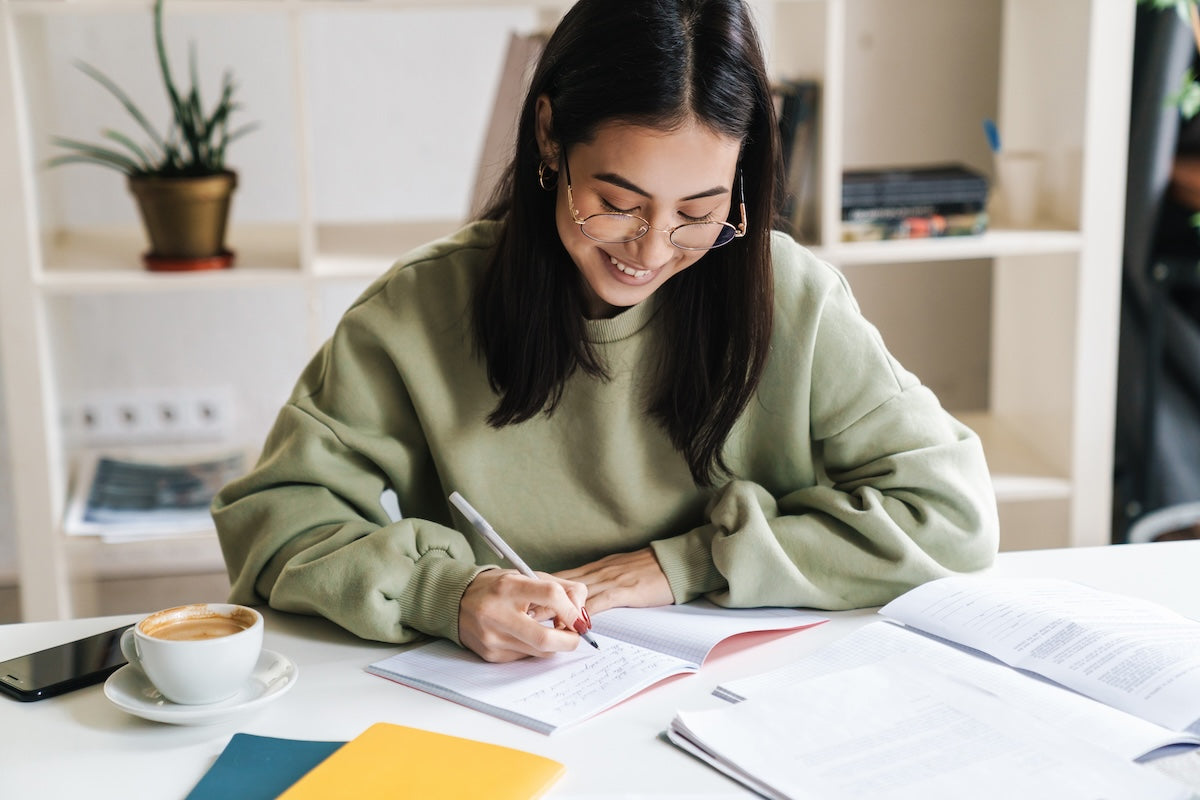 Young asian woman studying