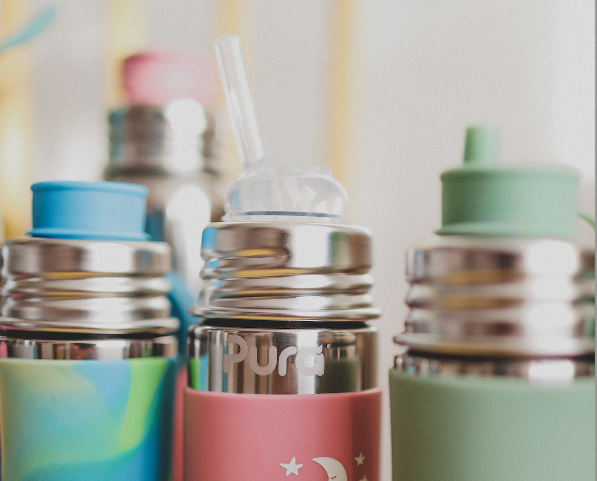 Stainless steel water bottles from Pura Stainless with different lids